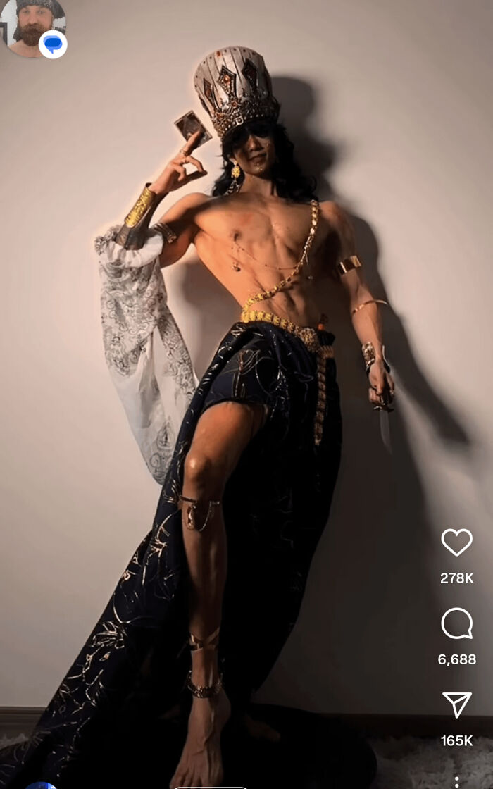 Person in elaborate costume and crown striking a dramatic pose, illustrating Instagram vs reality pics contrast.