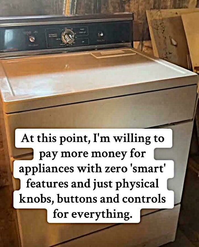 Vintage washing machine with physical knobs and buttons, reflecting things that make people feel very old.