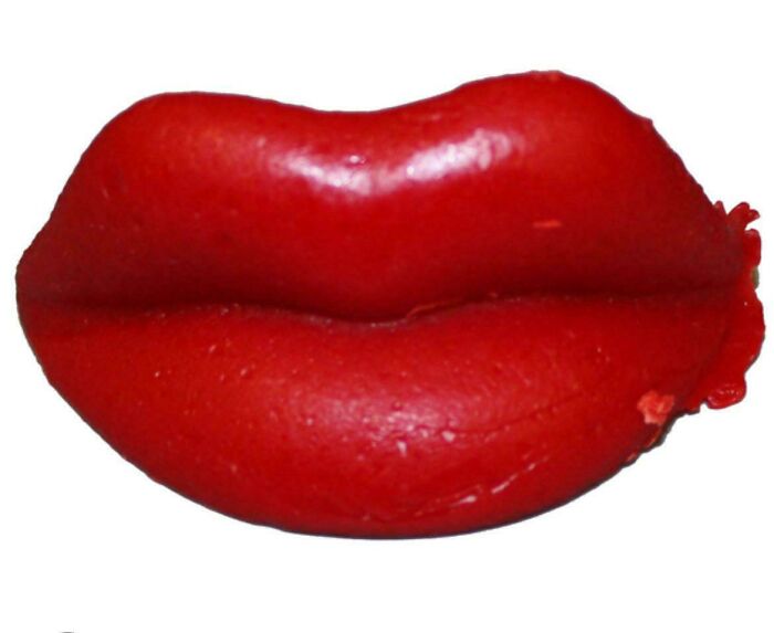 Red plastic lips toy, a nostalgic item that makes people who recognize it feel very old.