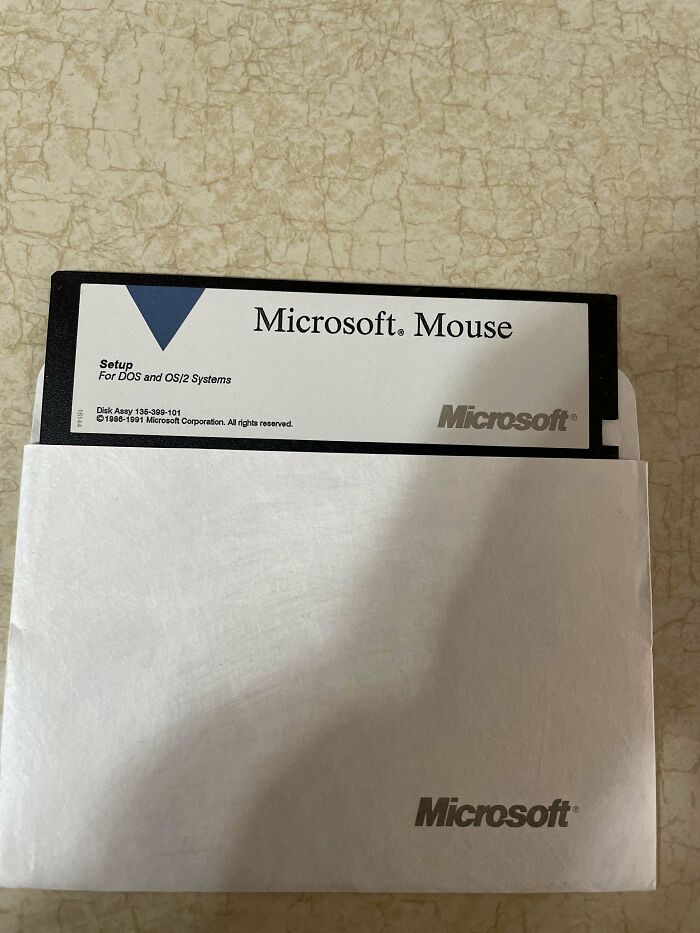 A vintage Microsoft Mouse setup floppy disk for DOS and OS/2 systems, a thing that makes people who recognize it feel very old.