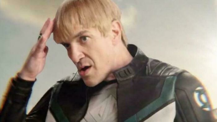 Man in a futuristic costume making a confused gesture highlighting bad movie details and confusing scenes in film.