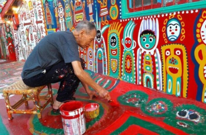 96-year-old artist in Taiwan painting colorful imagery to save his village, attracting tourists and preserving the site.