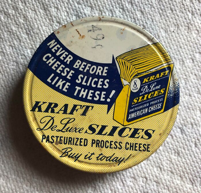 Vintage Kraft cheese tin showcasing pasteurized process slices from the 1950s, capturing life essence in the era.