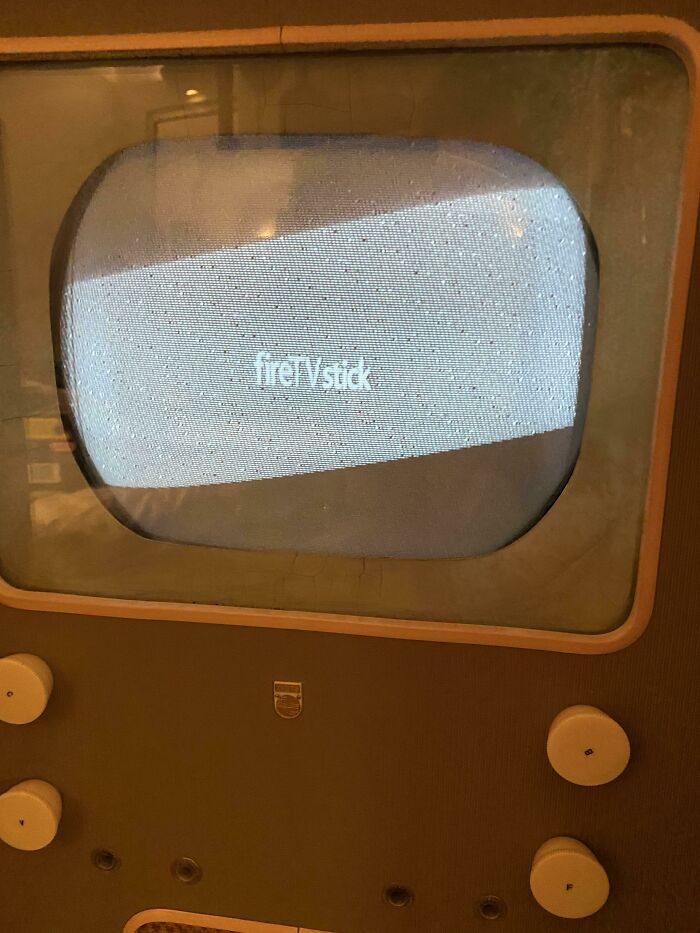 Vintage television from the 1950s displaying static, capturing the essence of life in the mid-20th century.