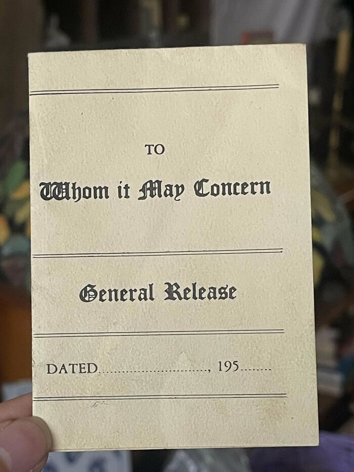 Vintage 1950s general release document with classic typography held in a hand, capturing the essence of life in the 1950s.