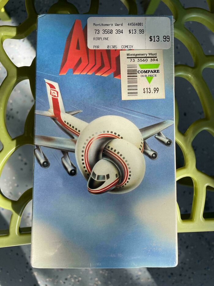 VHS tape of the movie Airplane with retro price tags, evoking nostalgia and memories of old age.