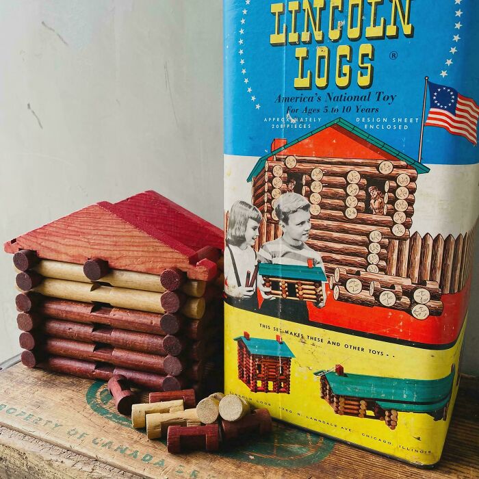 Vintage Lincoln Logs toy set with wooden log pieces and nostalgic packaging reminding of old age memories.