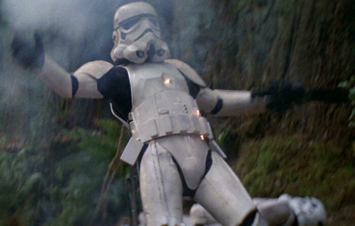 Stormtrooper armor sparks with sparks in forest scene, illustrating one of the most confusing bad movie details.