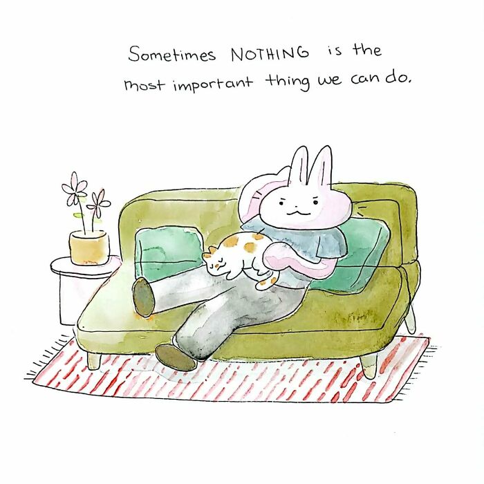 Watercolor comic of a bunny character resting on a couch with a cat, illustrating mental health and relaxation.