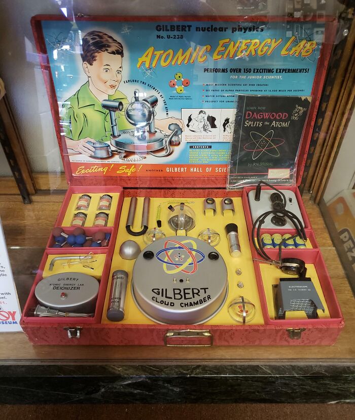 1950s vintage atomic energy lab kit with scientific tools and colorful packaging capturing essence of life in the 1950s.