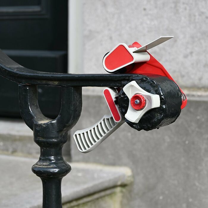 Street art clever reinterpretation of public spaces using everyday objects transformed into creative urban artwork.