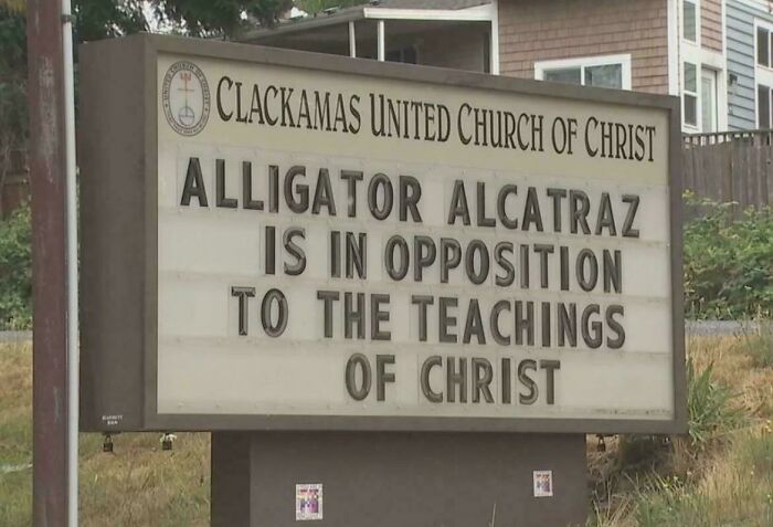 Church sign showing a humorous message, reflecting chaotic good actions that challenge traditional teachings creatively.
