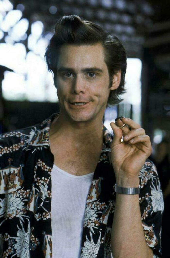 90s nostalgic memes featuring Jim Carrey in a patterned shirt making a quirky expression