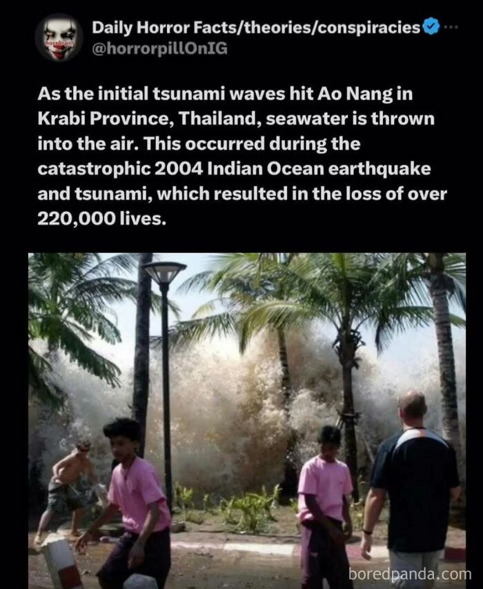 Tsunami waves hitting Ao Nang in Krabi Province during the 2004 Indian Ocean earthquake with people fleeing the water surge.