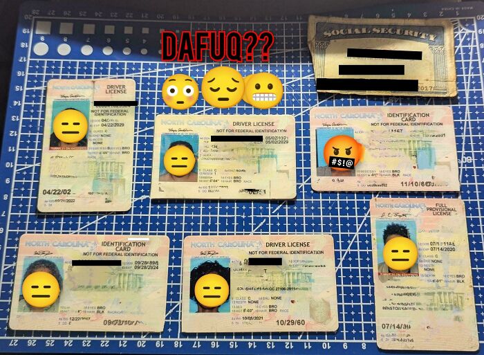 Various discarded North Carolina IDs and social security card found in a dumpster, showcasing dumpster diving treasures.