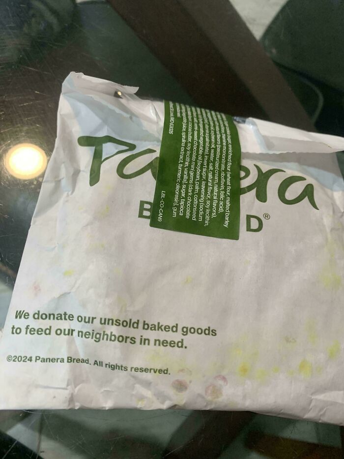 Panera Bread bag with a message about donating unsold baked goods, a dumpster diving treasure raccoons would be wowed by.
