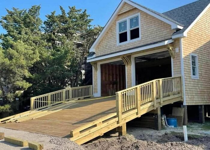 Wooden ramp built as a garage entrance showing creative home design ideas that failed in practical use.