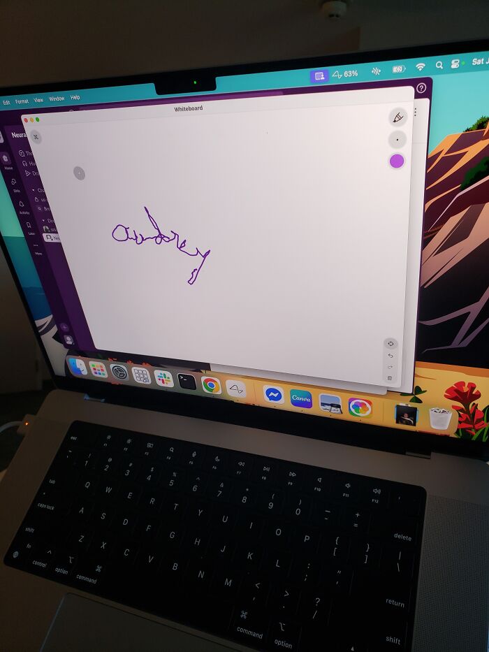 Laptop screen displaying digital handwriting on whiteboard, illustrating Elon Musk Neuralink brain chip technology in use. - 7