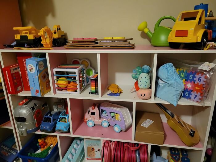 Shelf filled with colorful toys and educational items, featuring 50 most wished for products burning up Amazon this week.