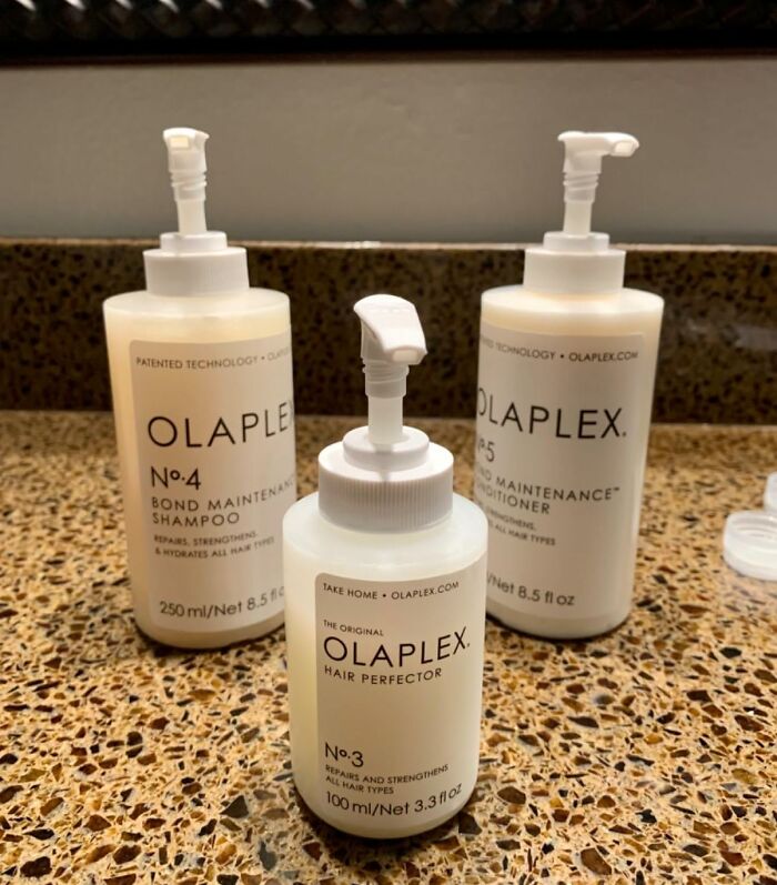 Olaplex hair care products on a bathroom counter as part of prime day deals under 25 dollars to keep your bank account safe