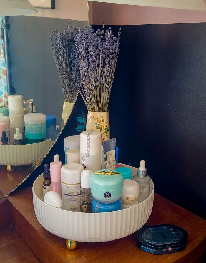 Rotating organizer holding skincare products and cosmetics to organize every chaotic corner of your home effectively.