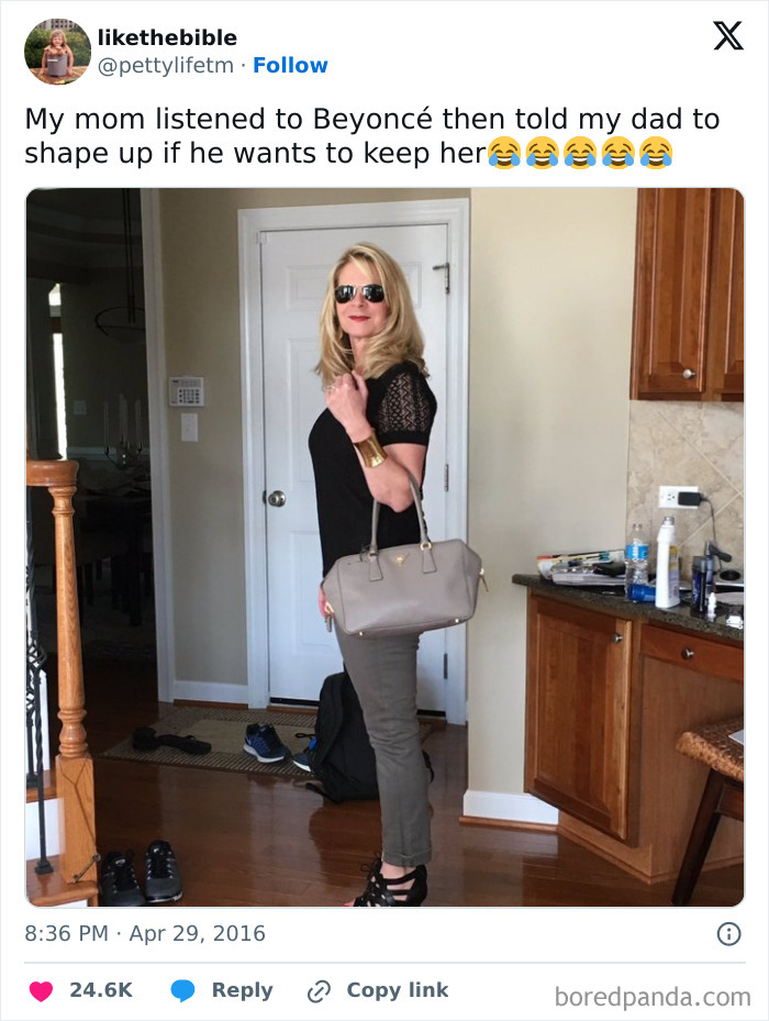 Woman wearing sunglasses and holding a purse, displaying a suspiciously unbothered attitude indoors.