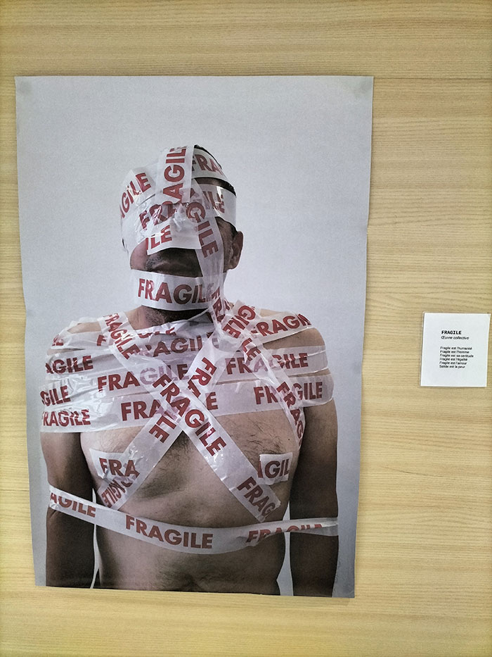 Man wrapped in fragile tape representing domestic violence and injury in a landmark case against ex-girlfriend.