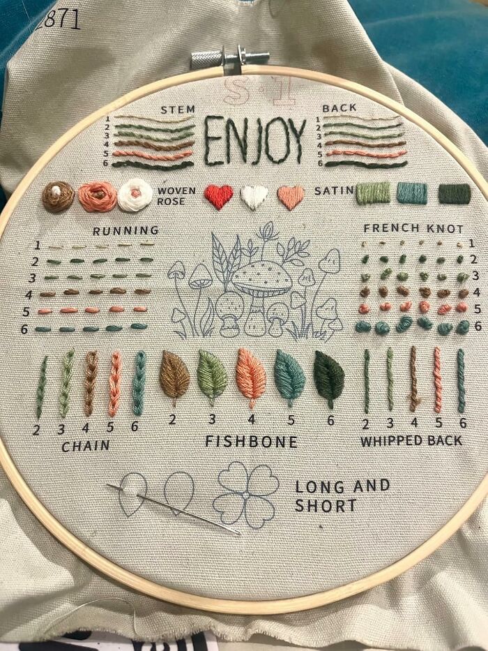 Embroidery hoop showing various stitch techniques, a needle, and colorful thread demonstrating fun hobbies for skill time.