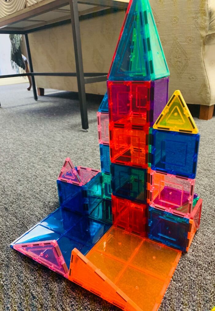 Colorful magnetic building blocks assembled into a geometric castle, perfect Prime Day treasures for unique gifts.
