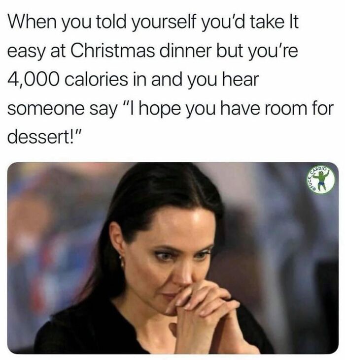 Woman looking worried after overeating at Christmas dinner, a relatable meme for gym-goers balancing food and fitness.