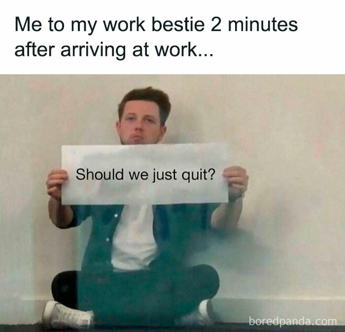 Man sitting on floor holding sign saying "Should we just quit?" representing relatable friendship memes at work.