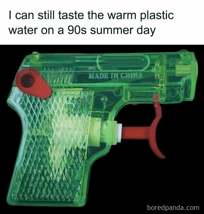 90s nostalgic toy water gun with transparent green plastic, capturing the magic of growing up in the ’90s summer days.