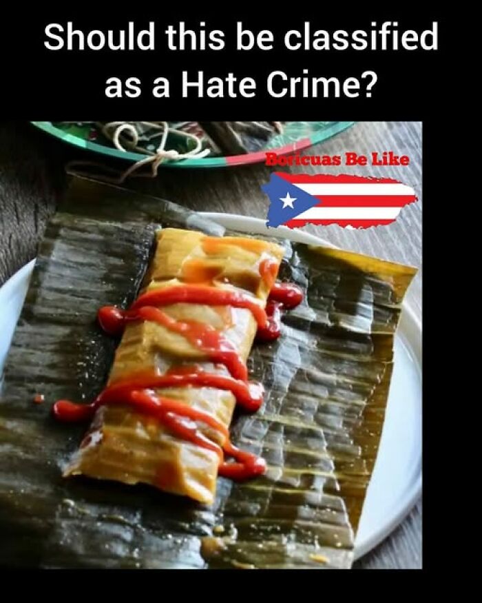Tamale with ketchup on a banana leaf and text referencing funny memes about being Hispanic culture.