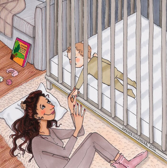 Illustration by Amanda Oleander showing a mother lying beside a crib, holding hands with her baby inside.