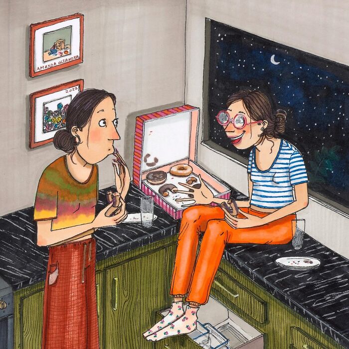 Two women sharing donuts in a kitchen at night, an illustration by Amanda Oleander capturing everyday moments.