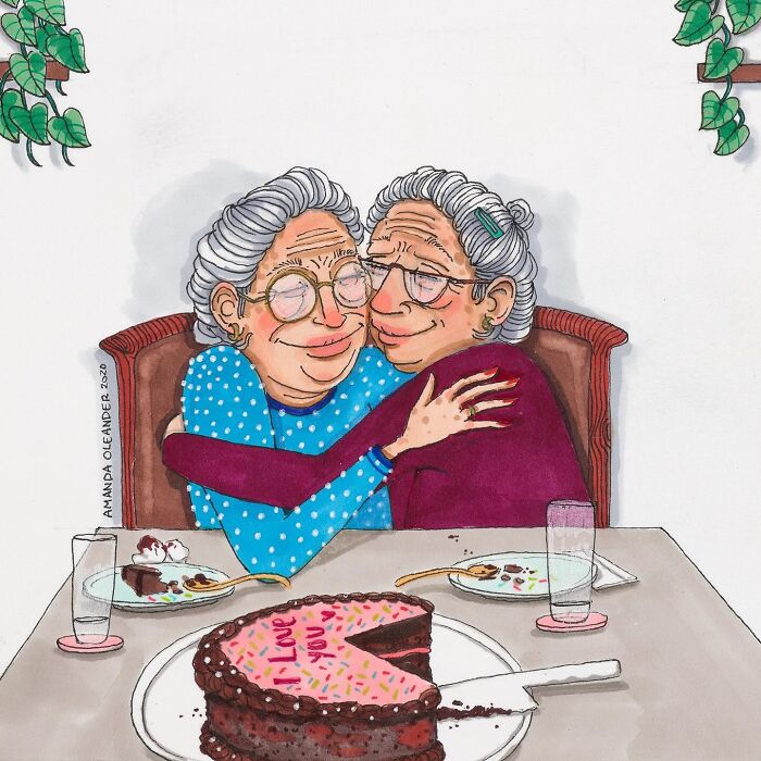 Illustration by Amanda Oleander showing two elderly women embracing over a table, capturing a tender everyday moment.