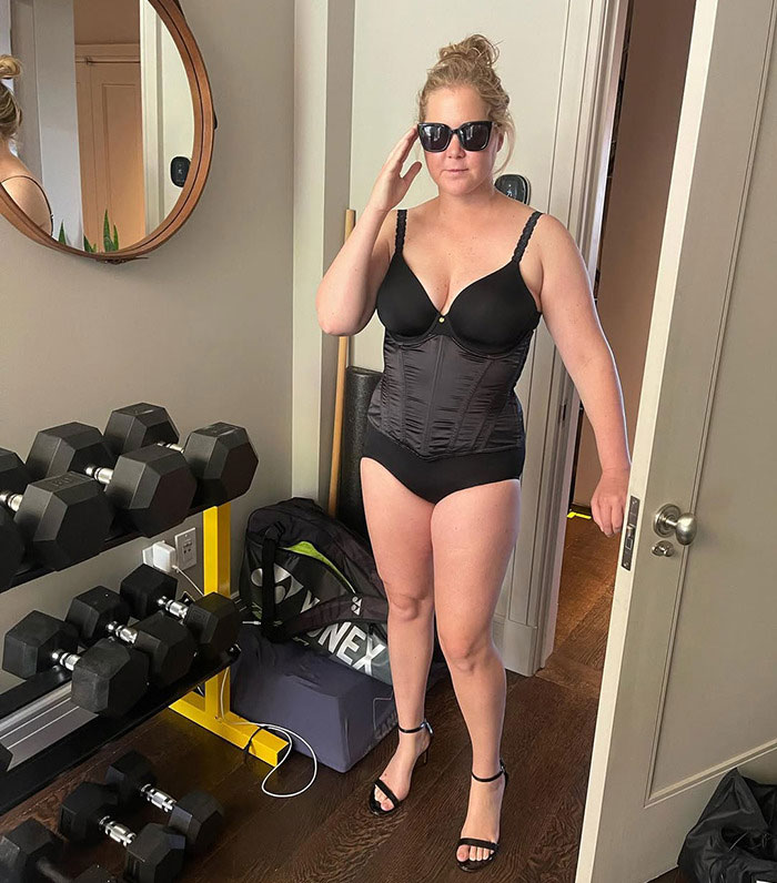 Amy Schumer flaunts thinnest-ever figure wearing black shapewear and sunglasses after using new weight loss jab. Amy Schumer flaunts thinnest-ever figure wearing black shapewear and sunglasses after using new weight loss jab.
