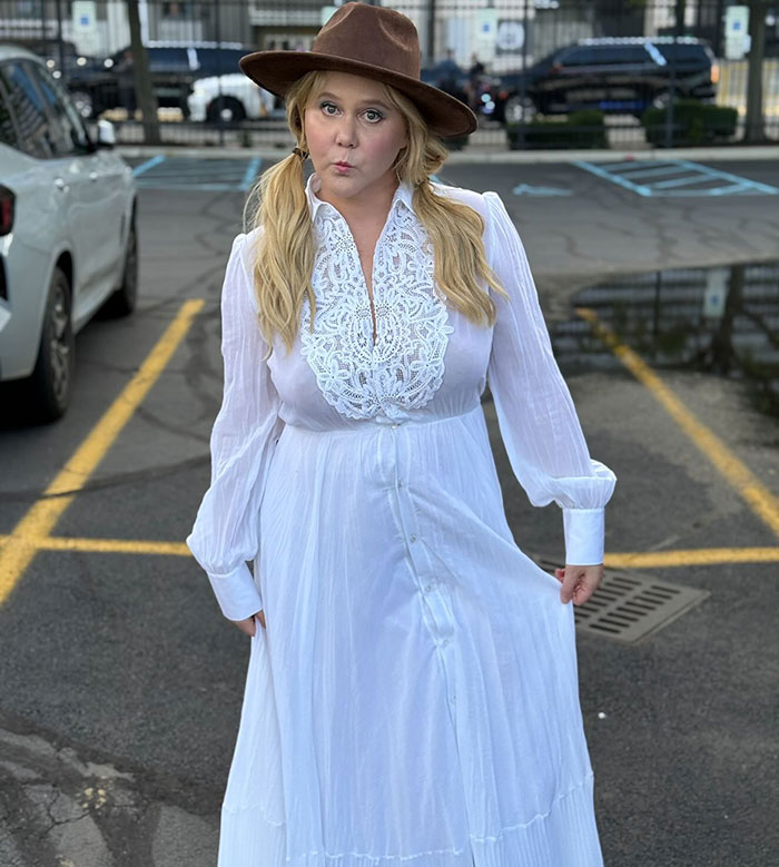 Amy Schumer wearing a brown hat and white dress, flaunting thinnest-ever figure after new weight loss jab news. Amy Schumer wearing a brown hat and white dress, flaunting thinnest-ever figure after new weight loss jab news.
