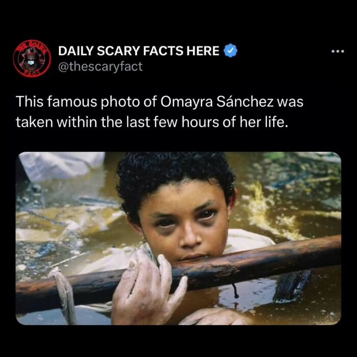 Young girl trapped in water, holding a wooden pole with a somber expression, illustrating a scary fact.