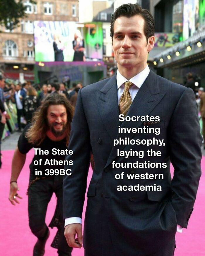 Two men on a pink carpet meme showing Socrates inventing philosophy while the State of Athens in 399BC chases him.