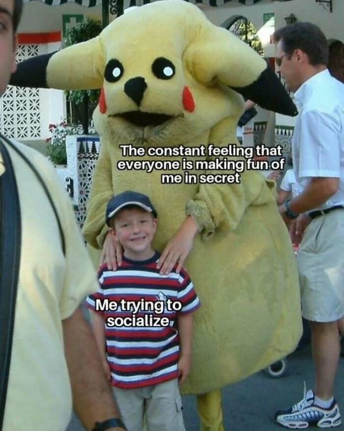 Person in Pikachu costume hugging smiling child, illustrating social anxiety memes about fear of being judged while socializing.