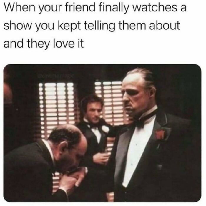 Scene from a movie with a man kissing another's hand, illustrating relatable friendship memes about shared favorite shows.