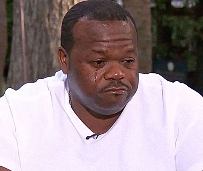 Man wearing white shirt with tears on his face, reflecting on woman abducted from hospital at 8 hours old story. Man wearing white shirt with tears on his face, reflecting on woman abducted from hospital at 8 hours old story.