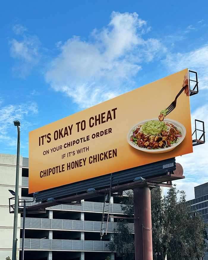 Chipotle billboard humor with honey chicken dish referencing brands that made fun of CEO caught cheating on Coldplay kiss cam.