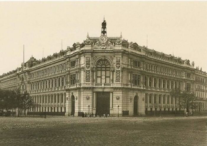Vintage photo of old architecture showcasing detailed classical design and ornate features of a historic building facade