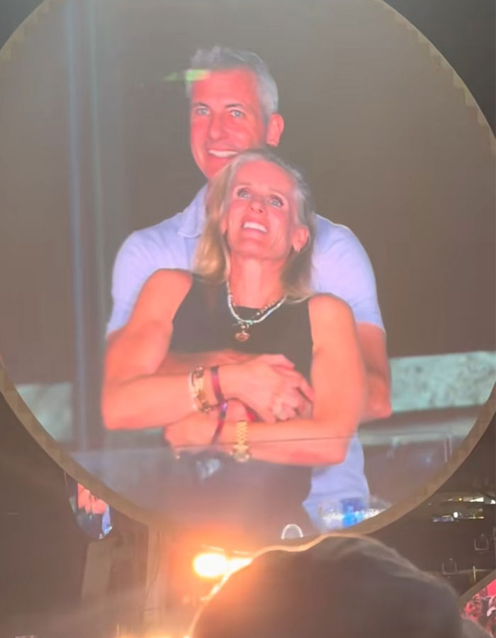 Couple featured on kiss cam at Coldplay concert, with Coldplay fan exposing cheating CEO through video capture.