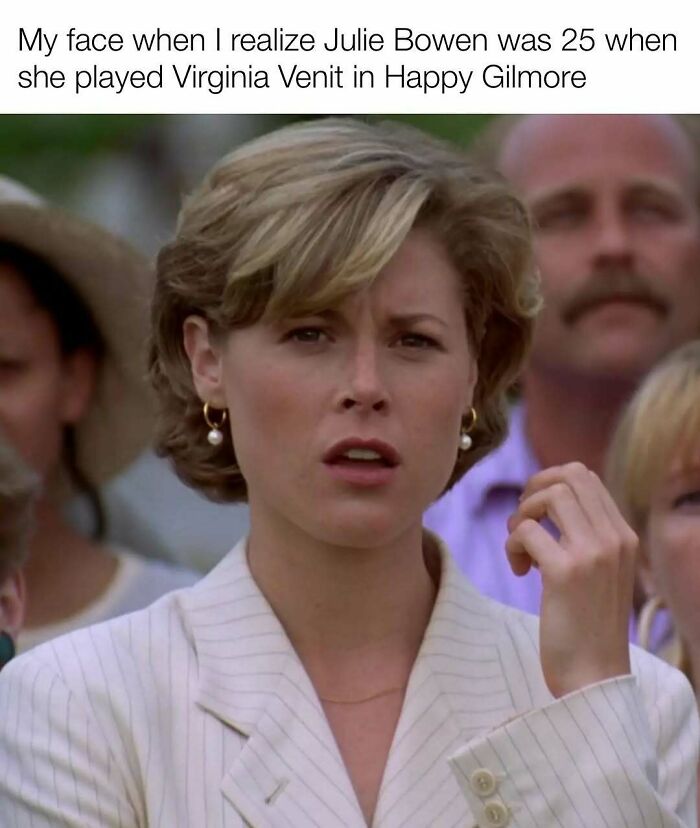 Woman in a pinstripe blazer making a confused face, a nostalgic meme for anyone who grew up with Tamagotchis and VHS tapes