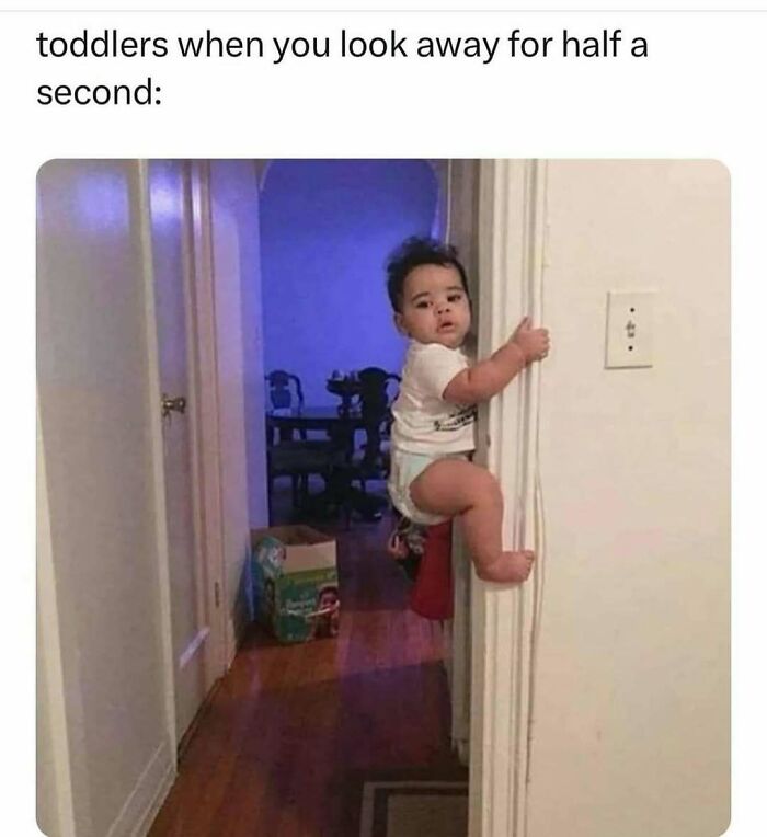 Toddler clinging to a wall edge with a surprised look, a funny meme reminding not to take life too seriously.
