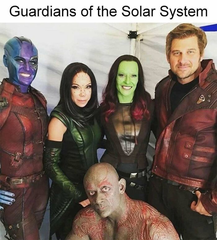 Cosplayers dressed as Guardians of the Galaxy characters posing humorously for cinephiles meme appreciation.