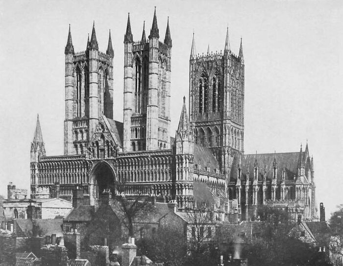 Gothic old architecture cathedral with tall spires and intricate stonework showcasing beautiful historical design.